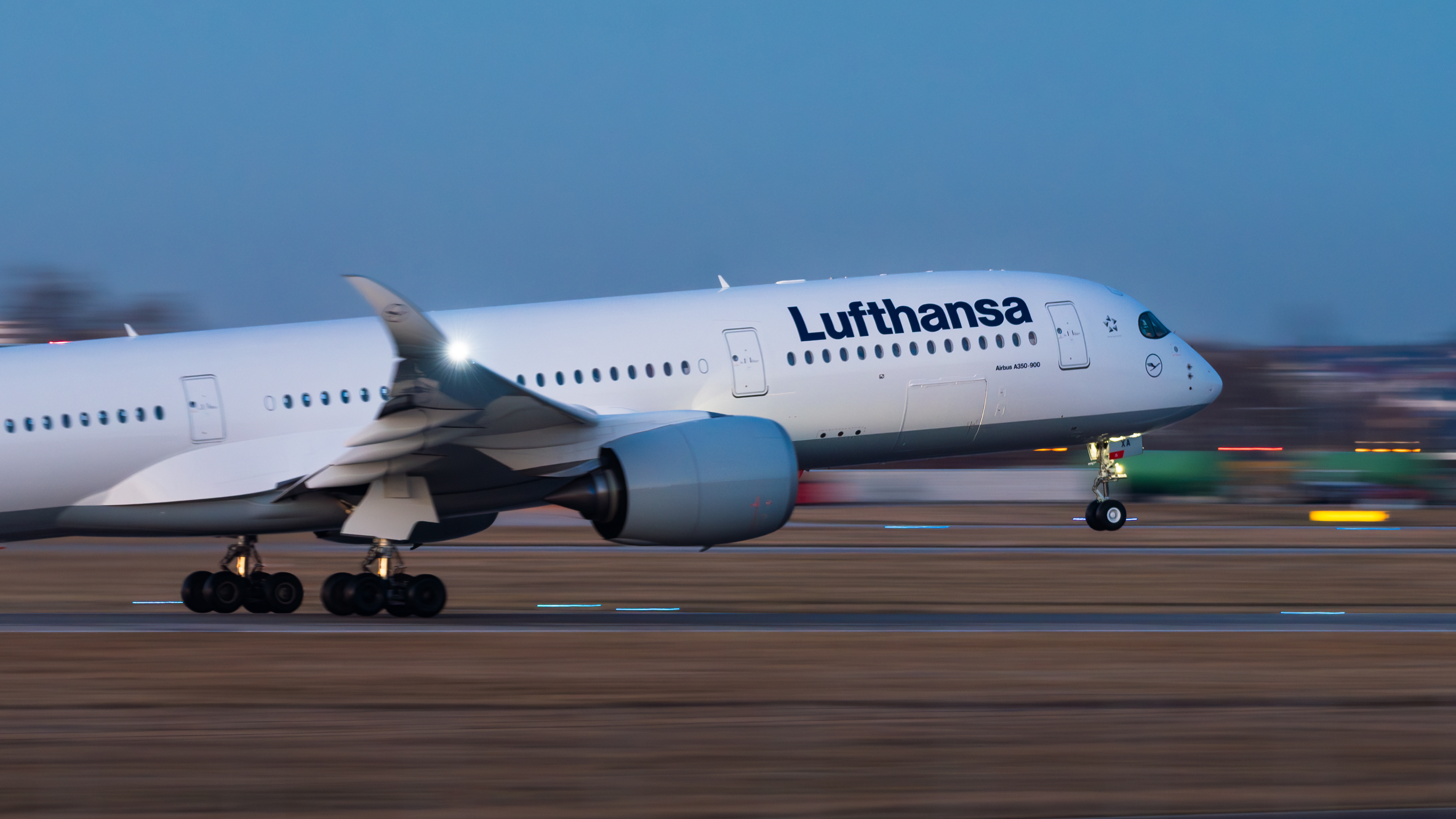 A Lufthansa Airbus A350 taking off from Stuttgart Airport